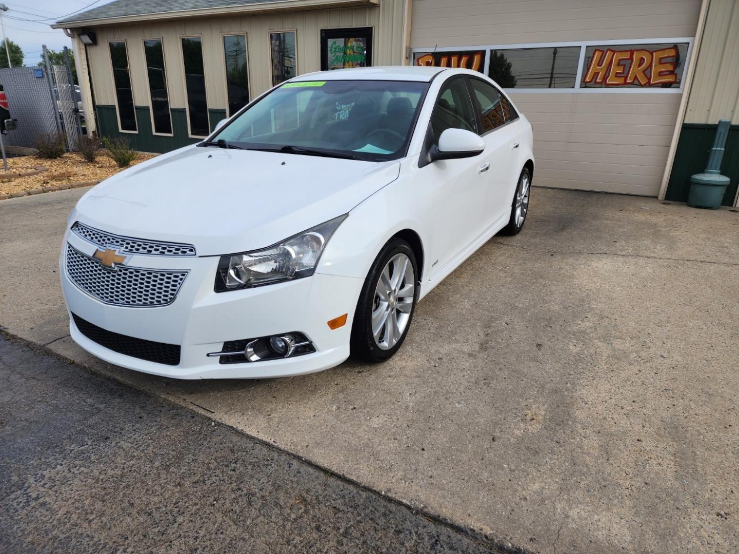 2012 WHITE /Black Chevrolet Cruze LTZ (1G1PH5SC1C7) with an 1.4L L4 DOHC 16V TURBO engine, 6-Speed Automatic transmission, located at 1221 Madison St., Shelbyville, TN, 37160, (931) 680-9439, 0.000000, 0.000000 - Photo#0