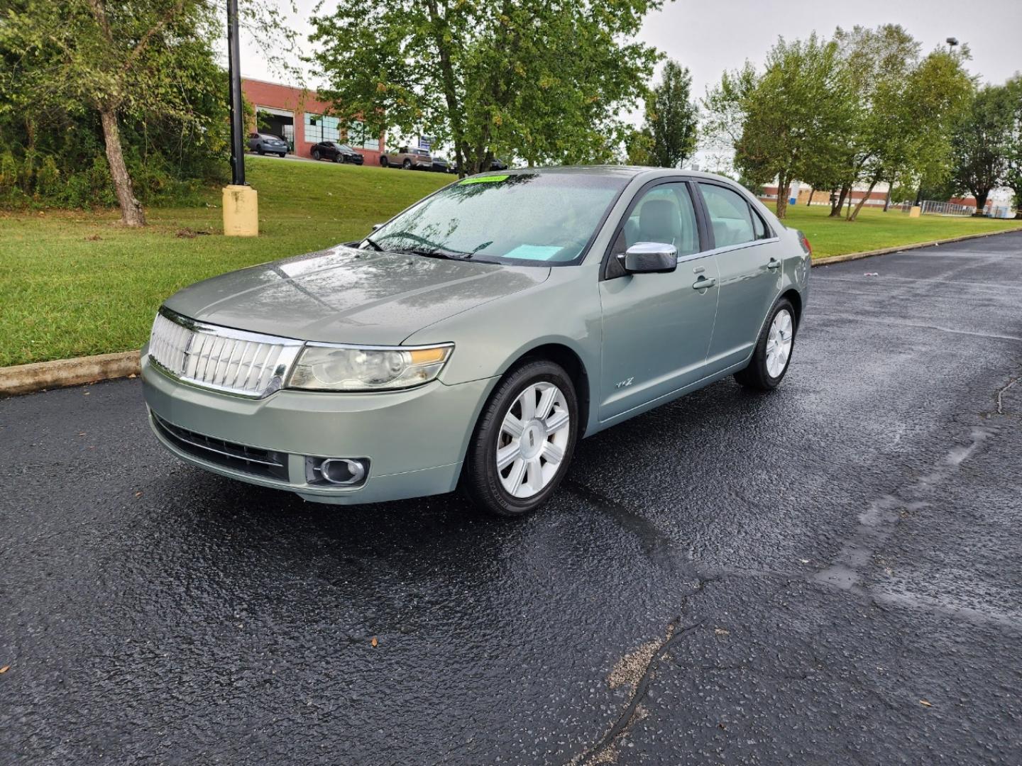 2009 Green /BEIGE Lincoln MKZ FWD (3LNHM26T89R) with an 3.5L V6 DOHC 24V engine, 6-Speed Automatic transmission, located at 1221 Madison St., Shelbyville, TN, 37160, (931) 680-9439, 0.000000, 0.000000 - Photo#0