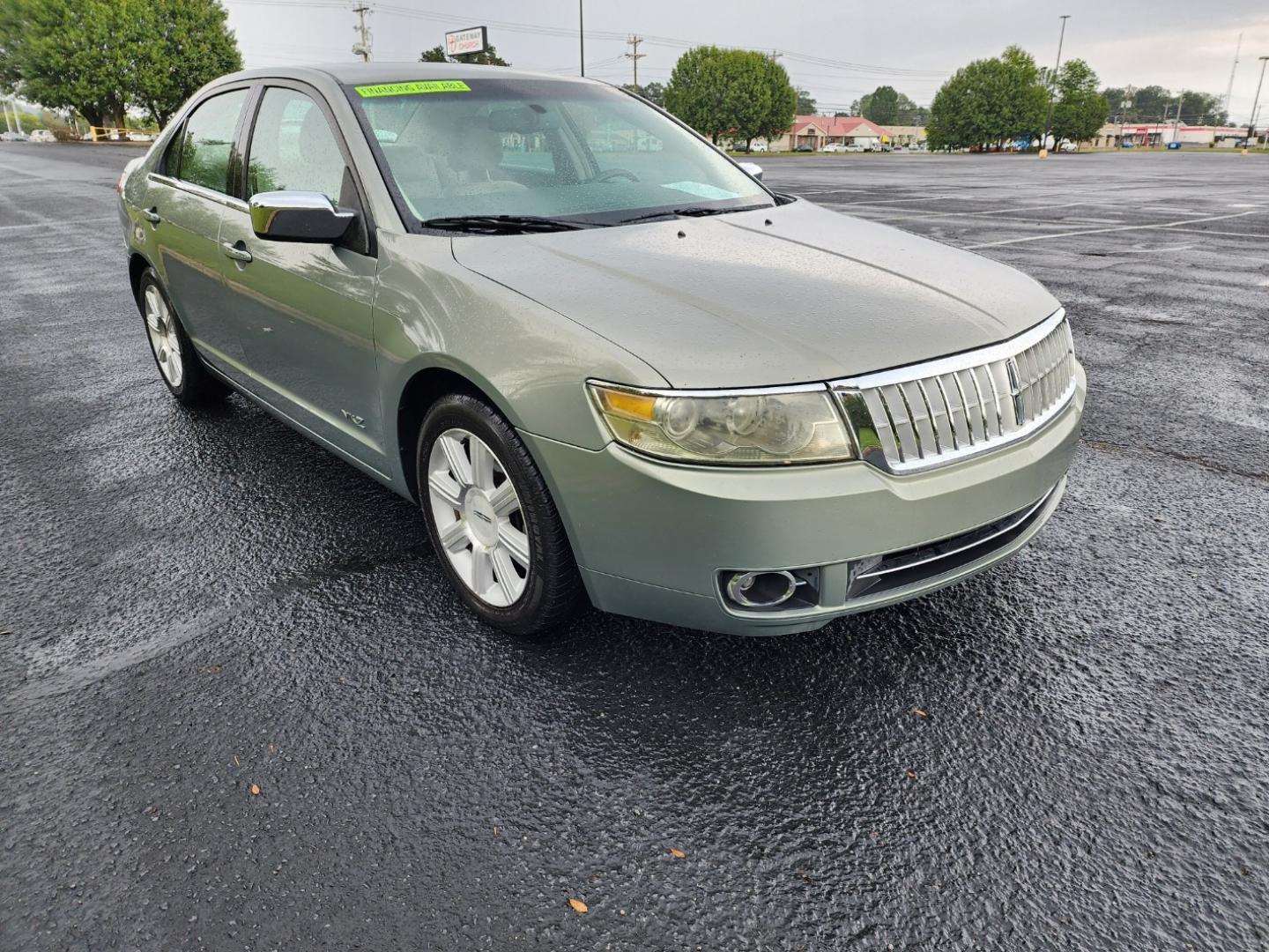 2009 Green /BEIGE Lincoln MKZ FWD (3LNHM26T89R) with an 3.5L V6 DOHC 24V engine, 6-Speed Automatic transmission, located at 1221 Madison St., Shelbyville, TN, 37160, (931) 680-9439, 0.000000, 0.000000 - Photo#1