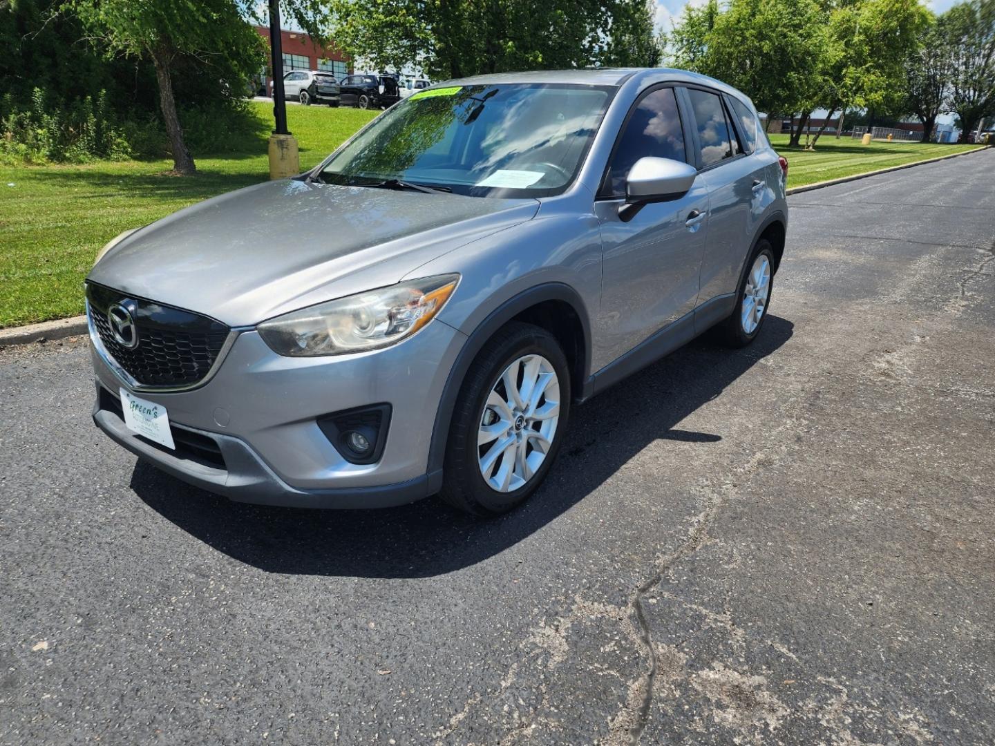 2014 Silver /Black Mazda CX-5 Grand Touring (JM3KE2DY9E0) with an 2.5L L4 DOHC 16V engine, 6-Speed Automatic transmission, located at 1221 Madison St., Shelbyville, TN, 37160, (931) 680-9439, 0.000000, 0.000000 - Photo#0