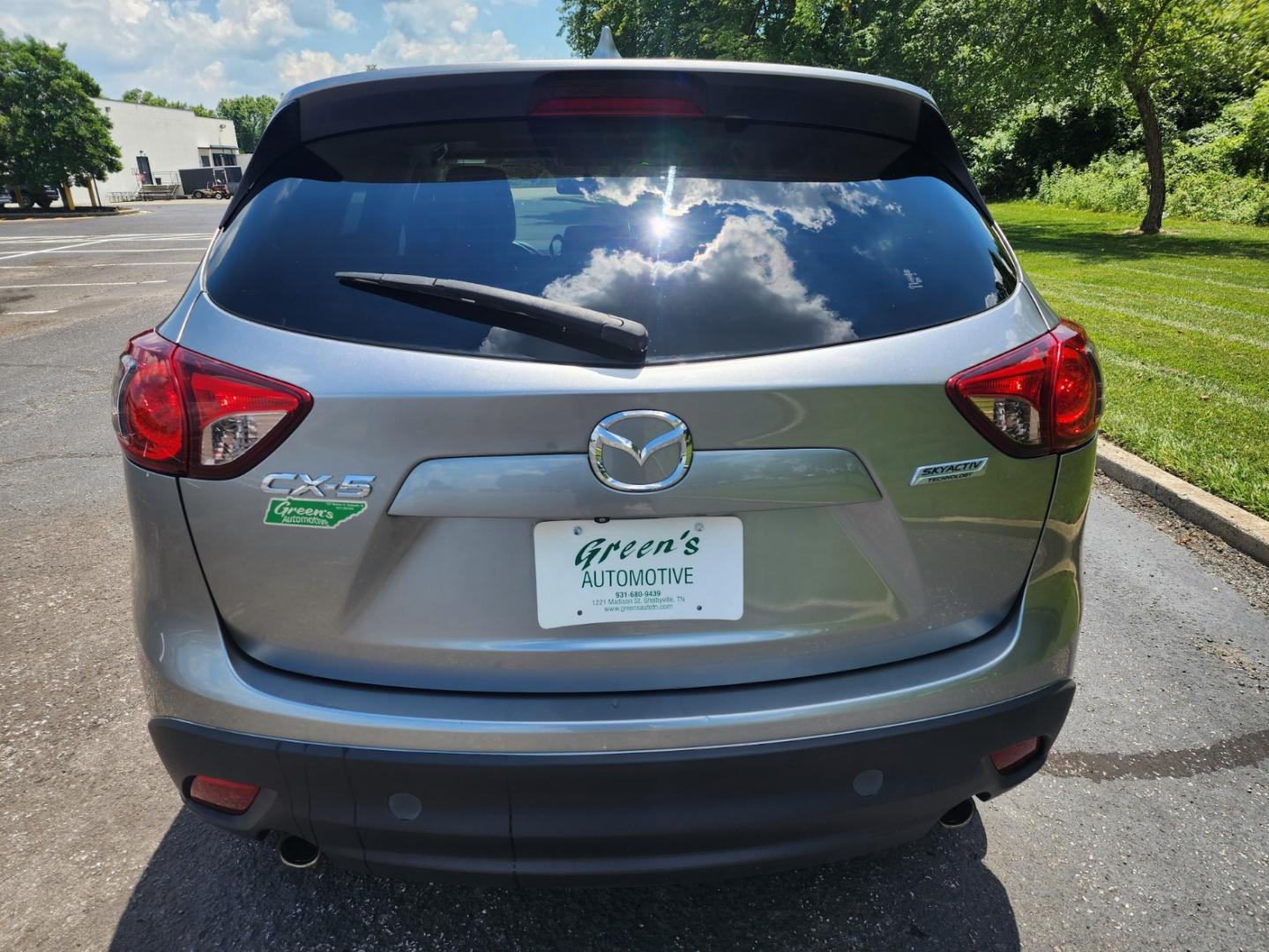 2014 Silver /Black Mazda CX-5 Grand Touring (JM3KE2DY9E0) with an 2.5L L4 DOHC 16V engine, 6-Speed Automatic transmission, located at 1221 Madison St., Shelbyville, TN, 37160, (931) 680-9439, 0.000000, 0.000000 - Photo#2