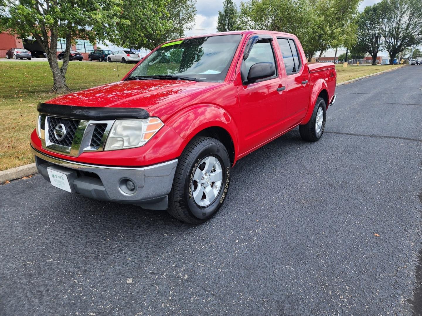 2009 RED /Gray Nissan Frontier SE Crew Cab 2WD (1N6AD07U09C) with an 4.0L V6 DOHC 24V engine, 5-Speed Automatic transmission, located at 1221 Madison St., Shelbyville, TN, 37160, (931) 680-9439, 0.000000, 0.000000 - Photo#0