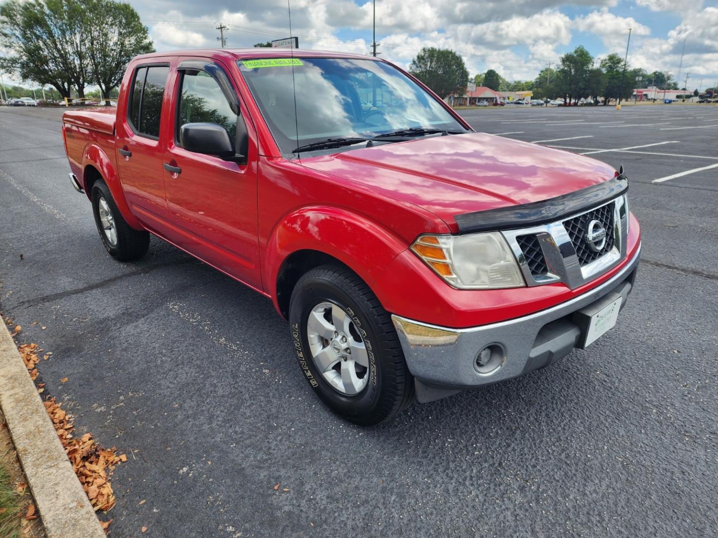 2009 RED /Gray Nissan Frontier SE Crew Cab 2WD (1N6AD07U09C) with an 4.0L V6 DOHC 24V engine, 5-Speed Automatic transmission, located at 1221 Madison St., Shelbyville, TN, 37160, (931) 680-9439, 0.000000, 0.000000 - Photo#1