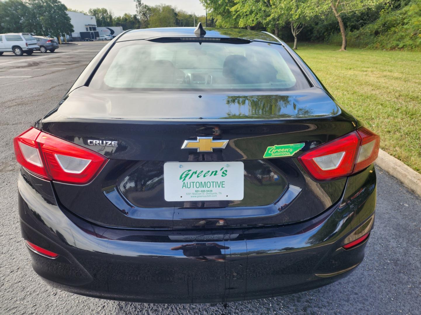 2018 BLACK /Black Chevrolet Cruze LS Auto (1G1BC5SM8J7) with an 1.4L L4 DOHC 16V TURBO engine, 6A transmission, located at 1221 Madison St., Shelbyville, TN, 37160, (931) 680-9439, 0.000000, 0.000000 - Photo#2