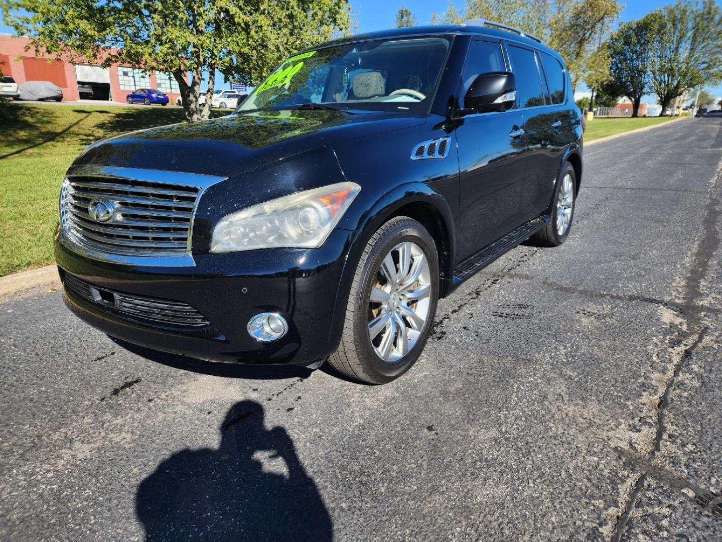 2011 BLACK /BEIGE Infiniti QX56 4WD (JN8AZ2NE0B9) with an 5.6L V8 DOHC 32V engine, 5-Speed Automatic transmission, located at 1221 Madison St., Shelbyville, TN, 37160, (931) 680-9439, 0.000000, 0.000000 - Photo#0