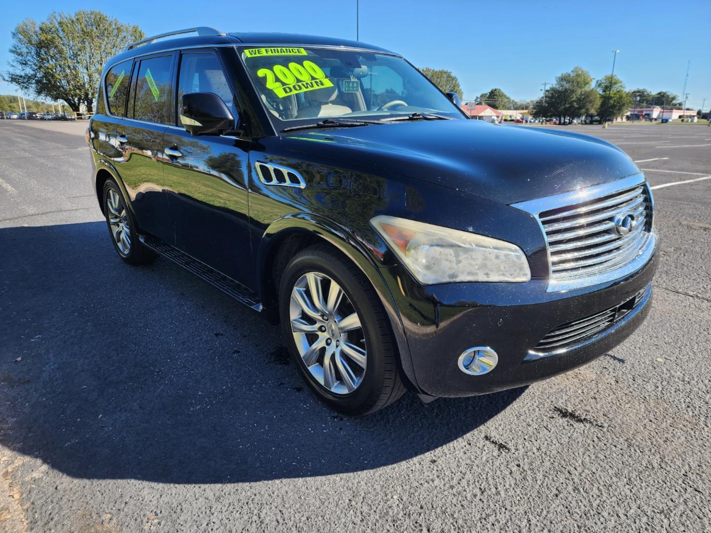 2011 BLACK /BEIGE Infiniti QX56 4WD (JN8AZ2NE0B9) with an 5.6L V8 DOHC 32V engine, 5-Speed Automatic transmission, located at 1221 Madison St., Shelbyville, TN, 37160, (931) 680-9439, 0.000000, 0.000000 - Photo#1