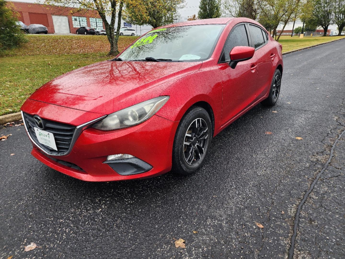 2015 RED /Black Mazda MAZDA3 i Sport AT 4-Door (JM1BM1U78F1) with an 2.0L L4 DOHC 16V engine, 6-Speed Automatic transmission, located at 1221 Madison St., Shelbyville, TN, 37160, (931) 680-9439, 0.000000, 0.000000 - Photo#0