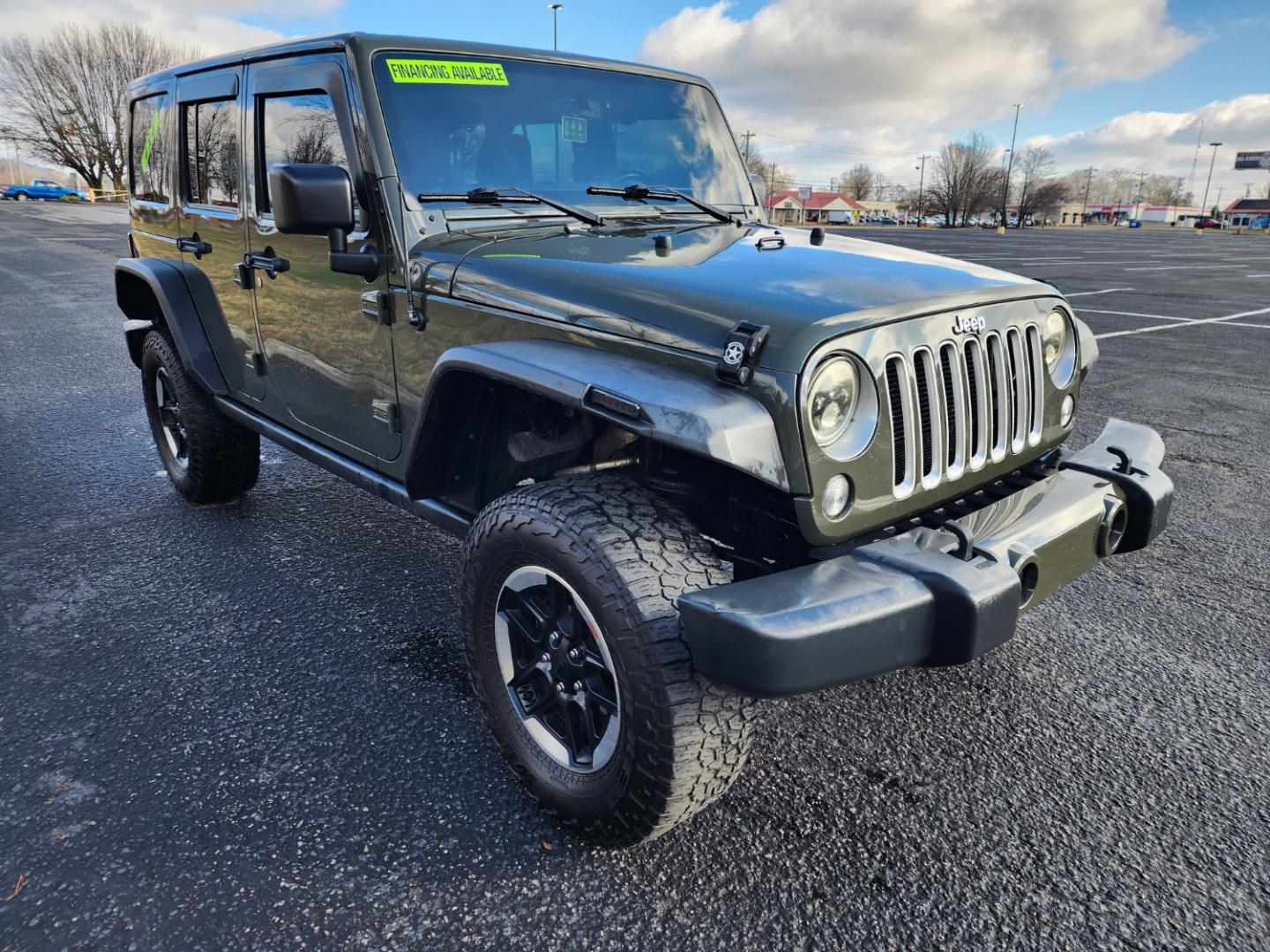 2016 Green /Black Jeep Wrangler Unlimited Sahara 4WD (1C4BJWEG7GL) with an 3.6L V6 DOHC 24V FFV engine, Automatic transmission, located at 1221 Madison St., Shelbyville, TN, 37160, (931) 680-9439, 0.000000, 0.000000 - Photo#1